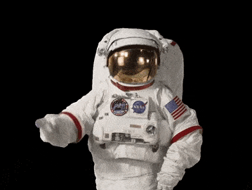 NASA astronaut tapping helmet GIF